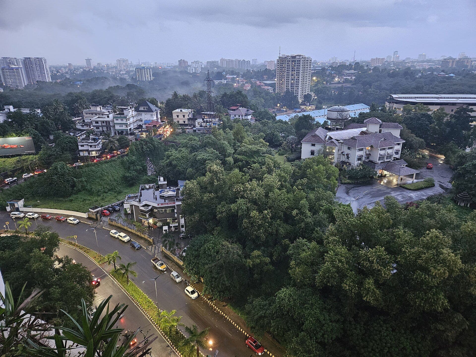 Kakkanad's Infopark IT corridor in Kochi with office buildings among green trees